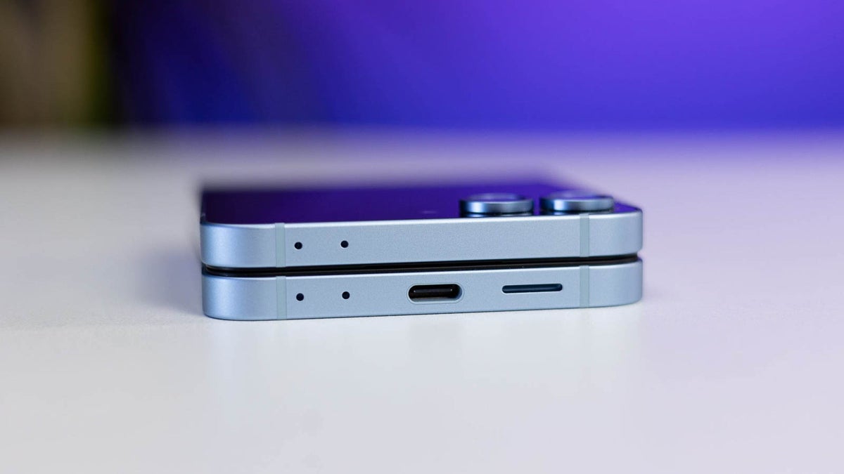 Foldable laying on a table while folded, with charging port showing.